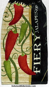 jalapenos peppers on hanging kitchen hand towel
