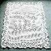 Lacy crib blanket in white