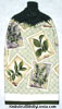 assortment of herbs on a hanging kitchen towel