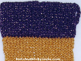 gold with purple jewels Christmas stocking close-up