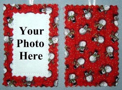 Snowmen on red background fabric ornament