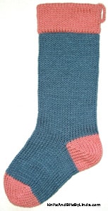 Country Blue knitted Christmas stocking with Rose Pink cuff, heel and toe
