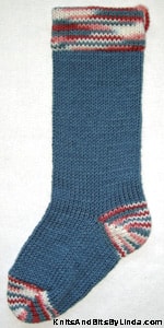 Country Blue knitted Christmas stocking with Wedgewood Multi-color cuff, heel and toe