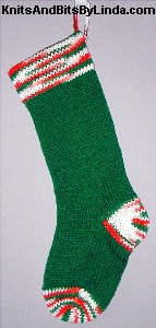 Traditional Green knitted Christmas stocking with Christmas Multi trim cuff, heel and toe