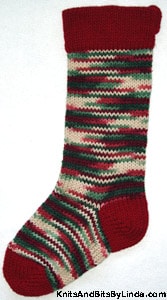 Holly & Ivy Multi knitted Christmas stocking with Burgundy cuff, heel and toe