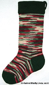 Holly & Ivy Multi knitted Christmas stocking with Hunter Green cuff, heel and toe