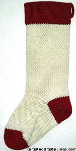 Ivory knitted Christmas stocking with Burgundy cuff, heel and toe
