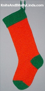 Traditional Hot Red knitted Christmas stocking with Paddy Green cuff, heel and toe