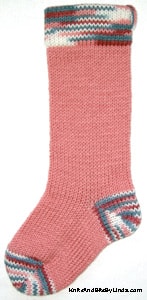 Rose Pink knitted Christmas stocking with Wedgewood Multi cuff, heel and toe