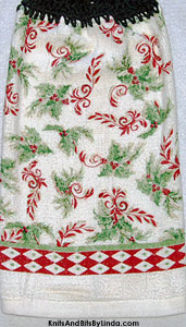 bunches of holly leaves on Christmas hand towel