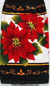 Christmas poinsettias on black background hand towel