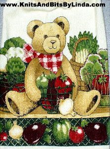 teddy bear surrounded by veggies hand towel