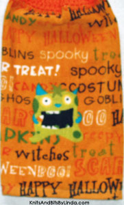 little green monster halloween kitchen towel
