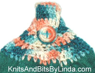 Pacific yarn top on a jade solid hand towel