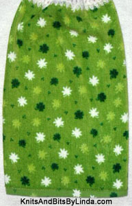  kitchen hand towel with shamrocks on green towel