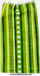 vertical rows of green stripes with shamrocks on hanging hand towel for St Patrick's Day