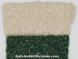 victorian green and aran shiny Christmas stocking close-up