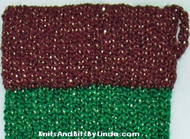 green and burgundy jewels close-up Christmas stocking