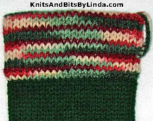 hunter stocking with holly & ivy trim